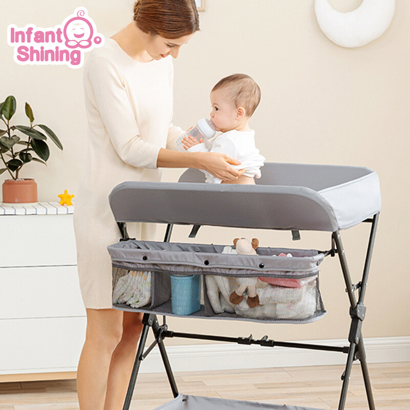 infant crib and changing table