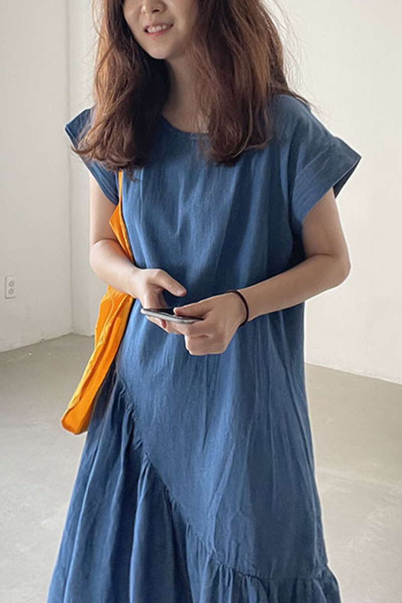韩版NUOVPAUL别致复古圆领宽松休闲设计中长款下摆不规则荷叶边连衣裙