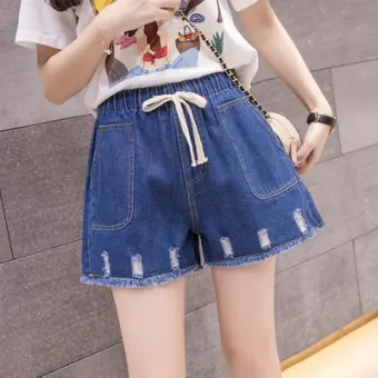 ripped jeans on fat legs