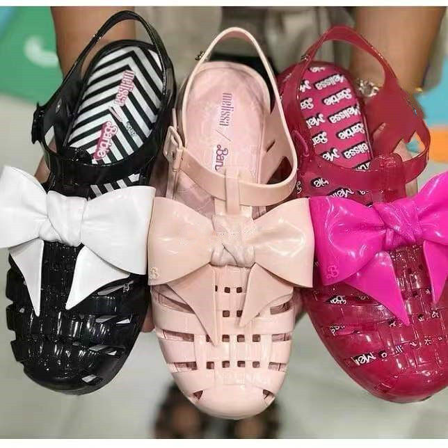 Mẫu mới 2022 melissa melissa nơ đan vải đế mềm đầu dập lỗ giày đi biển q