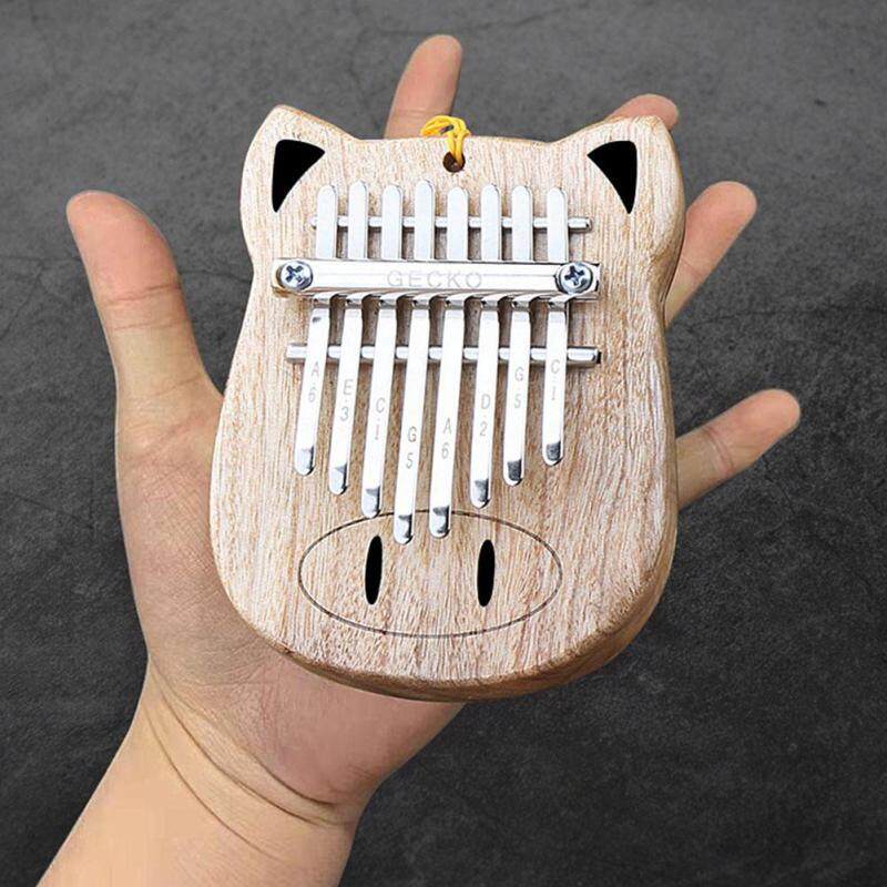 Ngón tay Bộ Gõ 8 Màu Hình Con Lợn Mini Âm Thanh Hoạt Hình Ngón Tay Cái Đàn Piano
