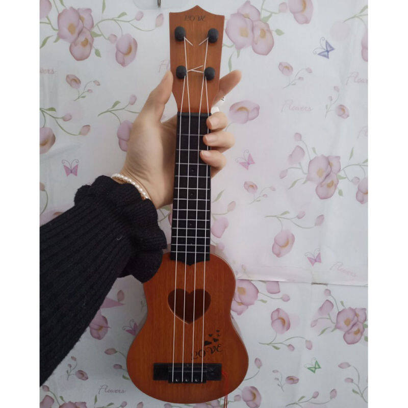 little guitar Childrens its toy can play the simulation medium ukulele beginners musical Malaysia