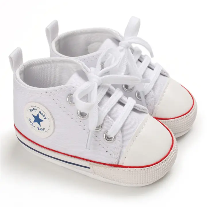 white canvas baby shoes