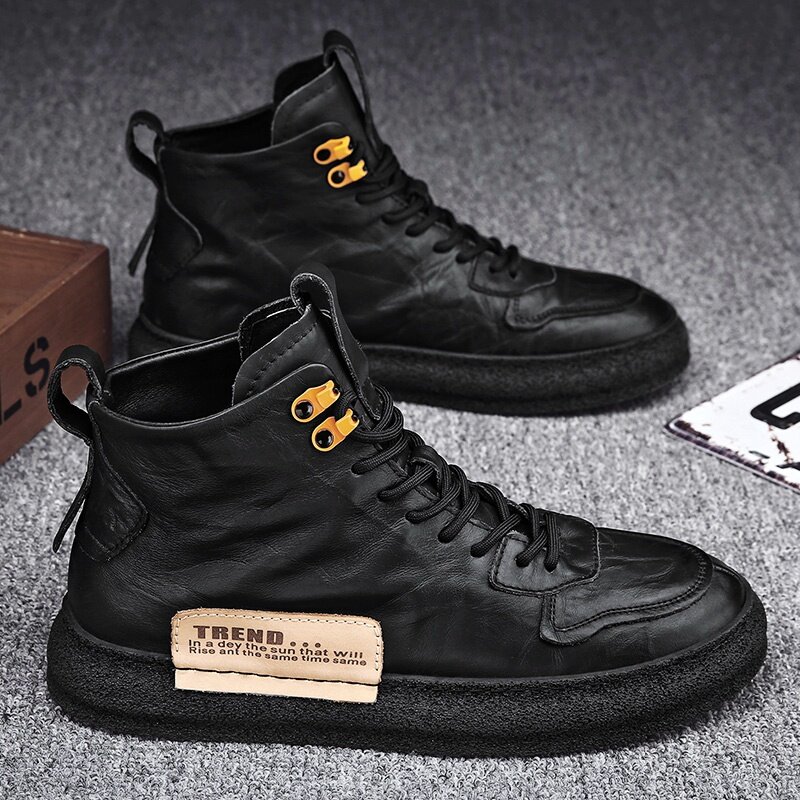 black high top leather shoes
