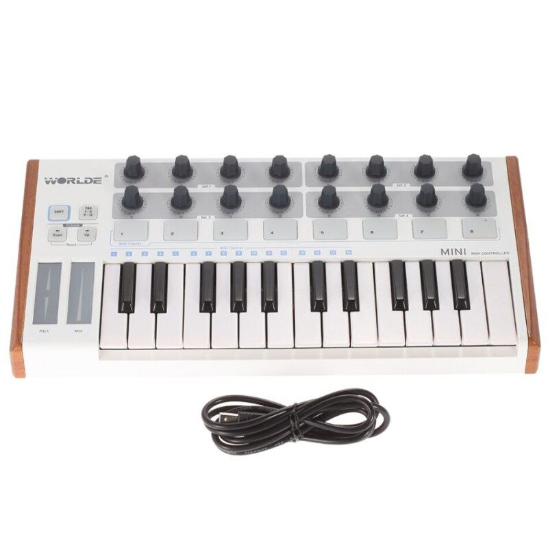 Worlde Tuna Mini Ultra-Portable 25-Key Usb Midi Keyboard Controller 8 Rgb Backlit Trigger Pads With 6.35Mm Pedal Jack Malaysia