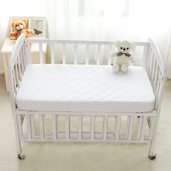 mini cot and mattress