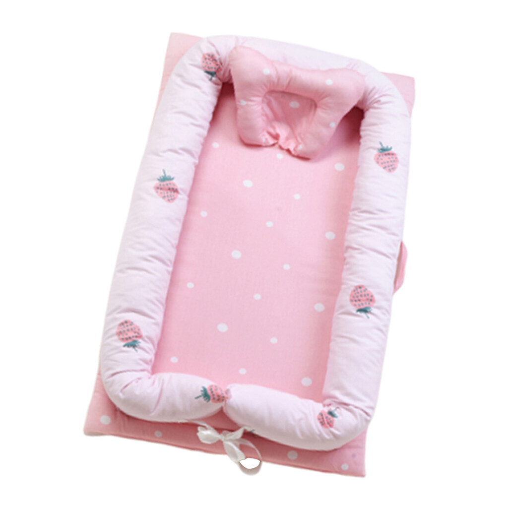 newborn sleeping on boppy lounger