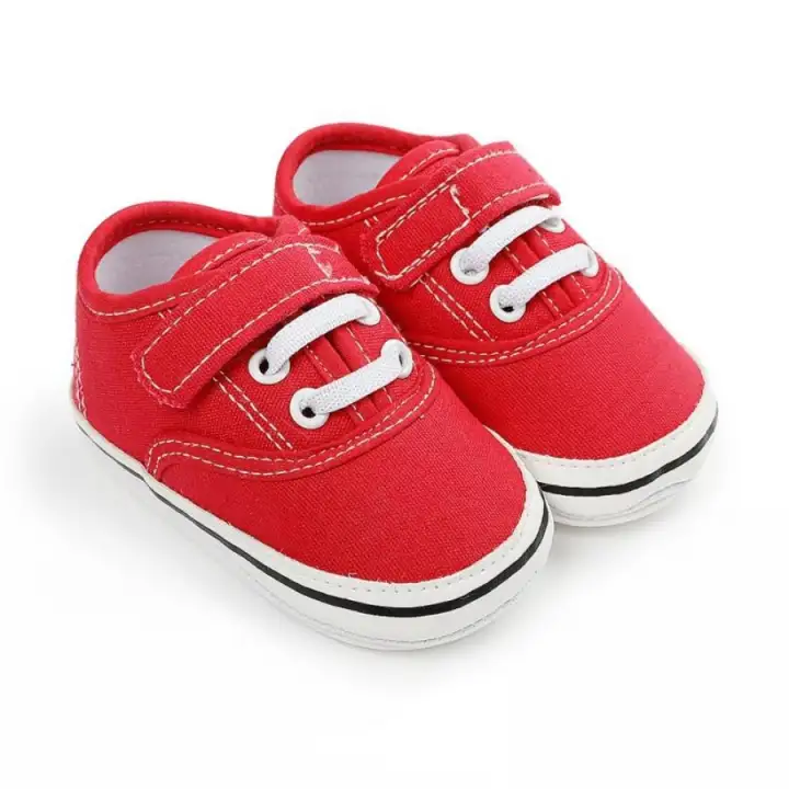 white canvas baby shoes