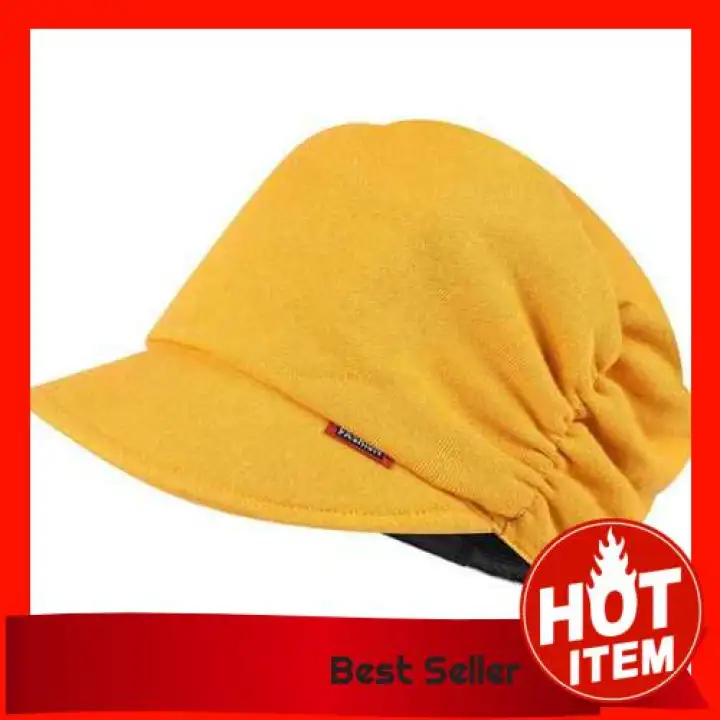 yellow newsboy hat