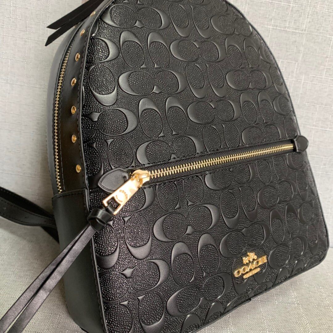 coach embossed backpack