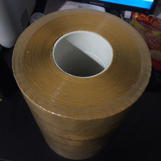 1 cuộn băng dính đục (1kg) lõi siêu mỏng